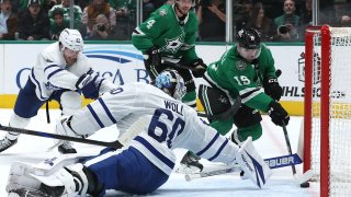 DALLAS, TEXAS – DECEMBER 18: Colin Blackwell #15 of the Dallas Stars scores a goal past Joseph Woll #60 of the Toronto Maple Leafs during the third period at American Airlines Center on December 18, 2024 in Dallas, Texas.