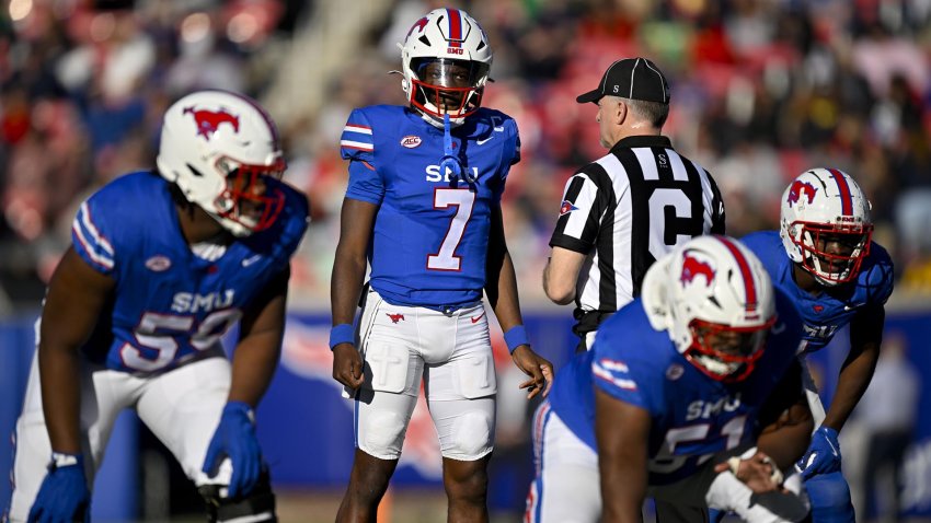 Nov 30, 2024; Dallas, Texas, USA; Southern Methodist Mustangs quarterback Kevin Jennings (7) in action during the game between the SMU Mustangs and the California Golden Bears at Gerald J. Ford Stadium.