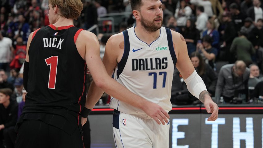 Dec 7, 2024; Toronto, Ontario, CAN; Dallas Mavericks guard Luka Doncic (77) shakes hands with Toronto Raptors guard Gradey Dick (1) at the end of the fourth quarter at Scotiabank Arena. Mandatory Credit: Nick Turchiaro-Imagn Images