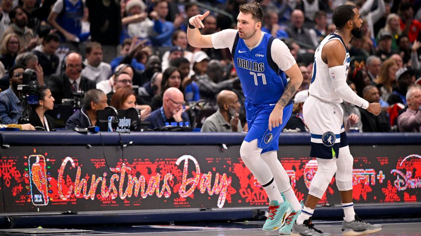 Dec 25, 2024; Dallas, Texas, USA; Dallas Mavericks guard Luka Doncic (77) celebrates after making a three point basket against the Minnesota Timberwolves during the first quarter at the American Airlines Center. Mandatory Credit: Jerome Miron-Imagn Images