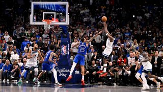 Dec 25, 2024; Dallas, Texas, USA; Minnesota Timberwolves guard Anthony Edwards (5) makes a basket against the Dallas Mavericks during the second half at the American Airlines Center. Mandatory Credit: Jerome Miron-Imagn Images