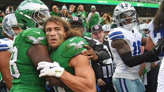 Dec 29, 2024; Philadelphia, Pennsylvania, USA; Philadelphia Eagles safety Sydney Brown (21) is held back after fight in the tunnel against the Dallas Cowboys at Lincoln Financial Field. Mandatory Credit: Eric Hartline-Imagn Images