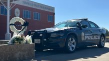 The police car belonging to slain Terrell police officer Jacob Candanoza sits parked outside police headquarters, Monday, Dec. 9, 2024. Candanoza was fatally shot during a traffic stop on Sunday night. 