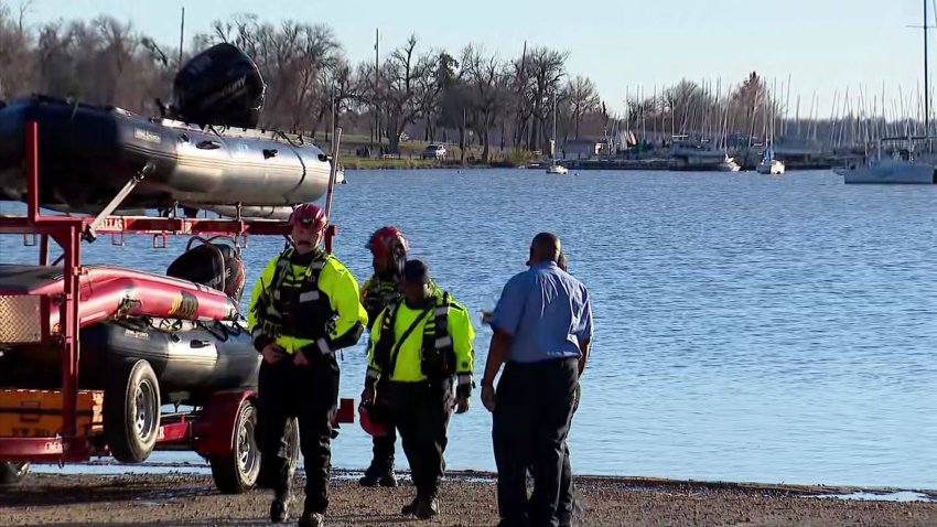 Dallas police and firefighters investigate after a body was found floating in White Rock Lake Tuesday, Dec. 31, 2024.