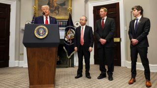 U.S. President Donald Trump delivers remarks on AI infrastructure, next to Oracle co-founder Larry Ellison, SoftBank CEO Masayoshi Son and OpenAI CEO Sam Altman at the Roosevelt room at White House in Washington, U.S., January 21, 2025. REUTERS/Carlos Barria
