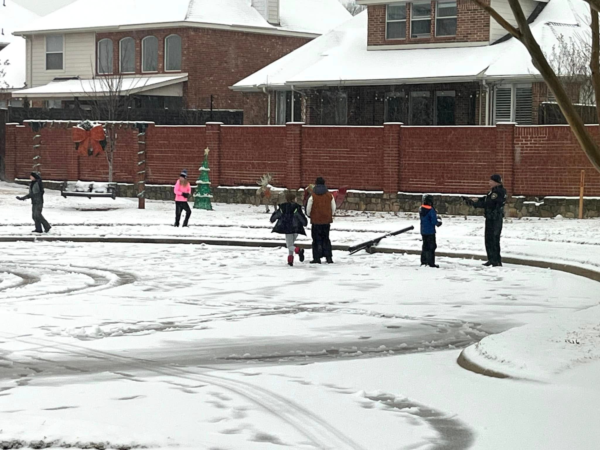 Good afternoon,
I know you are looking for photos for today’s snow day and are often on the hunt for items for the Something Good Segment.  I wanted to share that Cottonwood Creek Elementary School Resource Officer Jim “J.T.” Turner drove around the school’s neighborhood to check on his kids and ended up in a snowball fight with them today, creating special memories.  Officer Turner is a Coppell Police Officer who works as the SRO at Cottonwood Creek Elementary every day when school is in session.  He focuses on great relationships with his kids, as evident in the photos attached.
I hope you will consider sharing.
Thanks,
Amanda
Amanda Simpson,<br />
CPC<br />
Director of Communications<br />
Coppell Independent School District<br />
200 S. Denton Tap Road<br />
Coppell, Texas75019<br />
 214-496-6060<br />
 asimpson@coppellisd.com<br />
 coppellisd.com
​OPEN RECORDS/CONFIDENTIALITY NOTICE: This email and responses may be subject to Texas Open Records laws and may be disclosed to the public upon request. Please respond accordingly.<br />
​<br />
Exceptions to Texas Open Records laws are emails that may contain confidential student and/or employee information. Unauthorized use of disclosure is prohibited under federal privacy laws. If you are not the intended recipient, you may not use, disclose, copy or disseminate this information. Please call the sender immediately or reply by email and destroy all copies of the original message, including attachments.