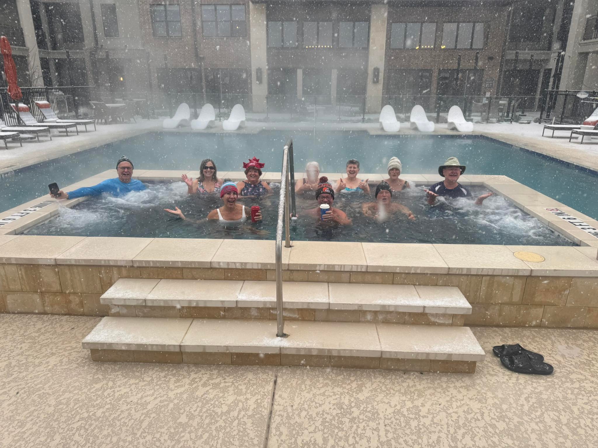 Residents of the new 55+ Active Adult Community, Avenida Carrollton, took the polar plunge in style this morning….with beverages in the hot tub!