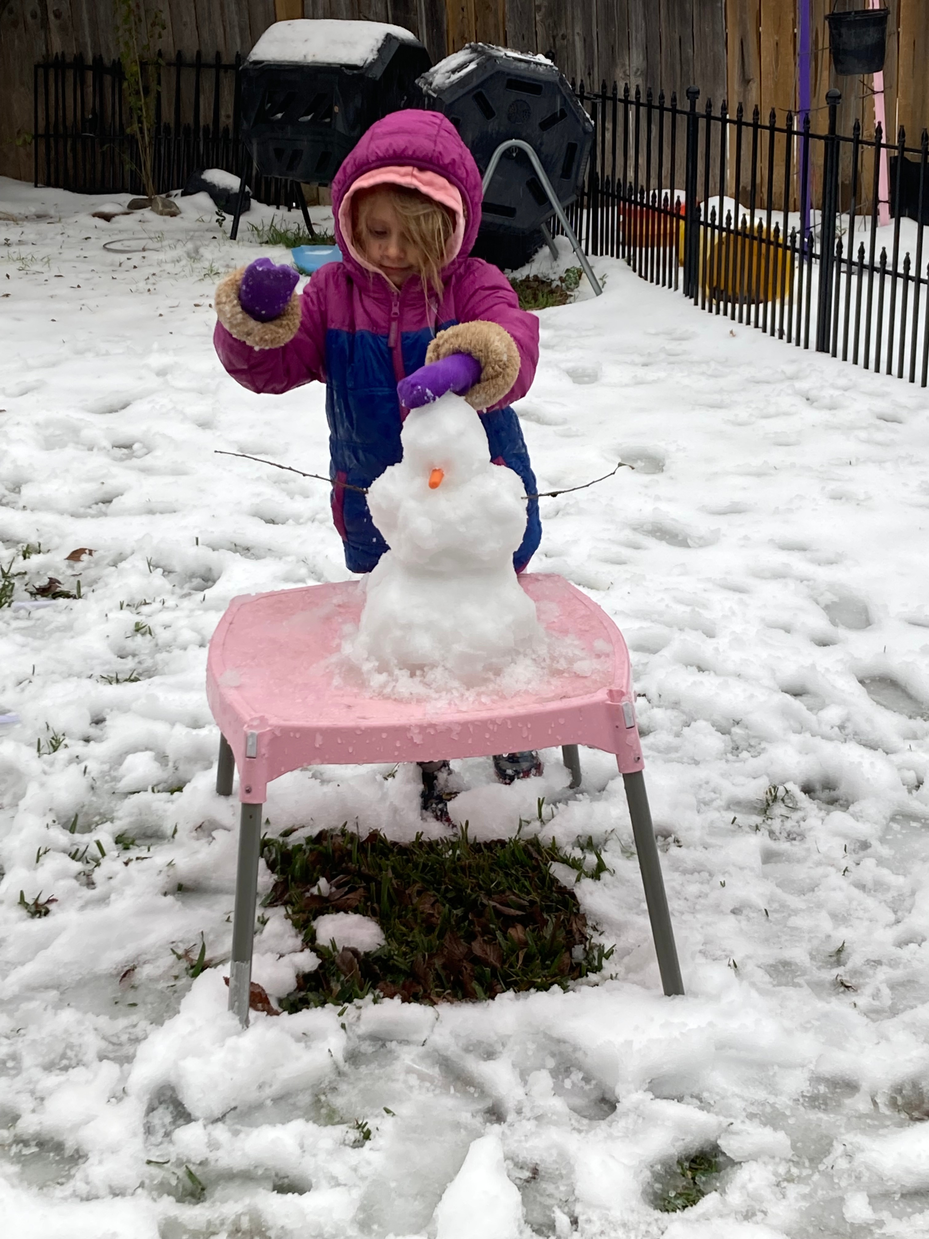 Abigail was so excited that Elsa came and dropped snow on her house. She got to build her first snowman.