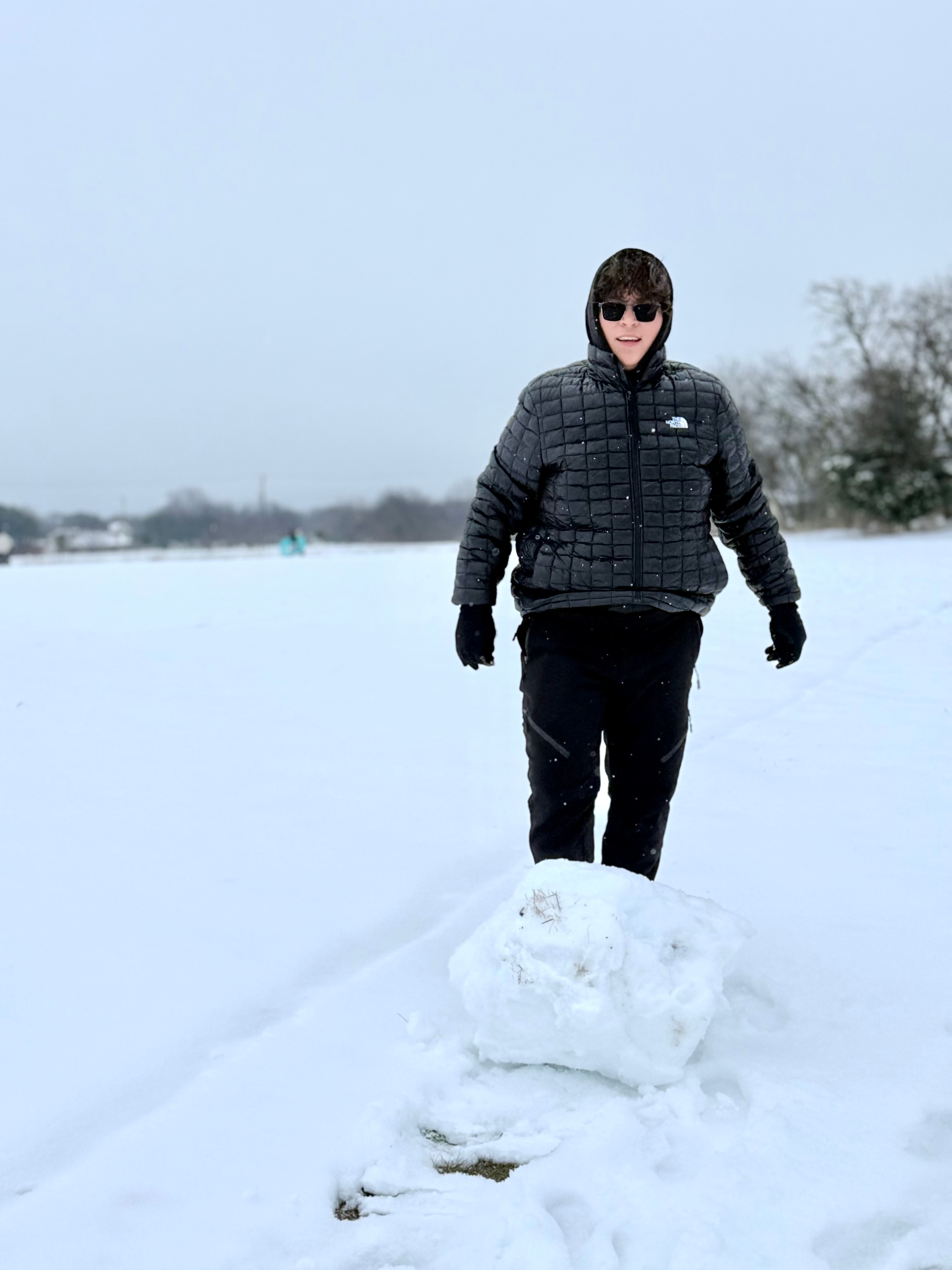 Perfect type of snow to build a snowman in McKinney TX.<br />
Ayden is ready