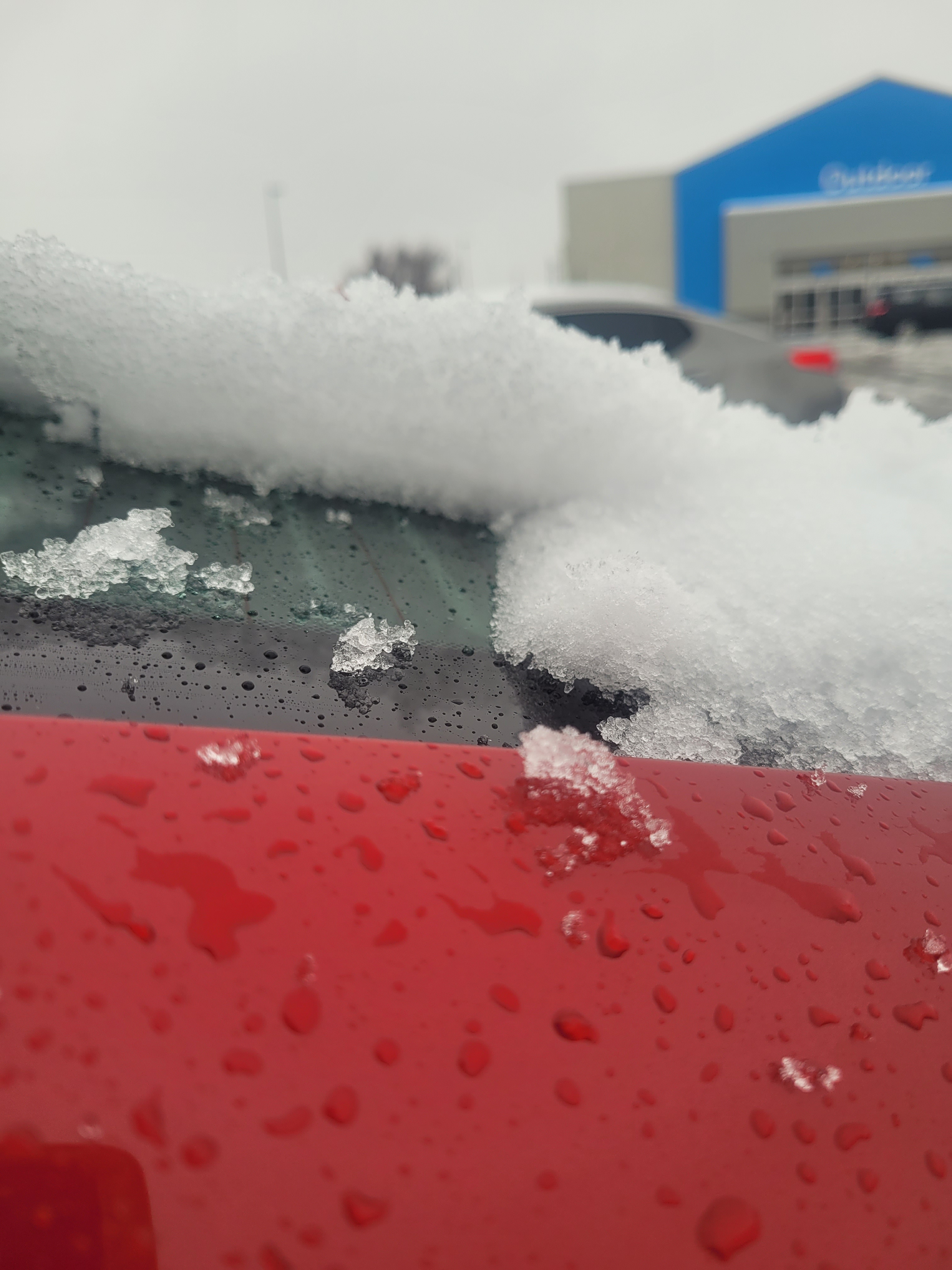 After work I had to clear the snow off my windows of my car, this is how much snow was on my car