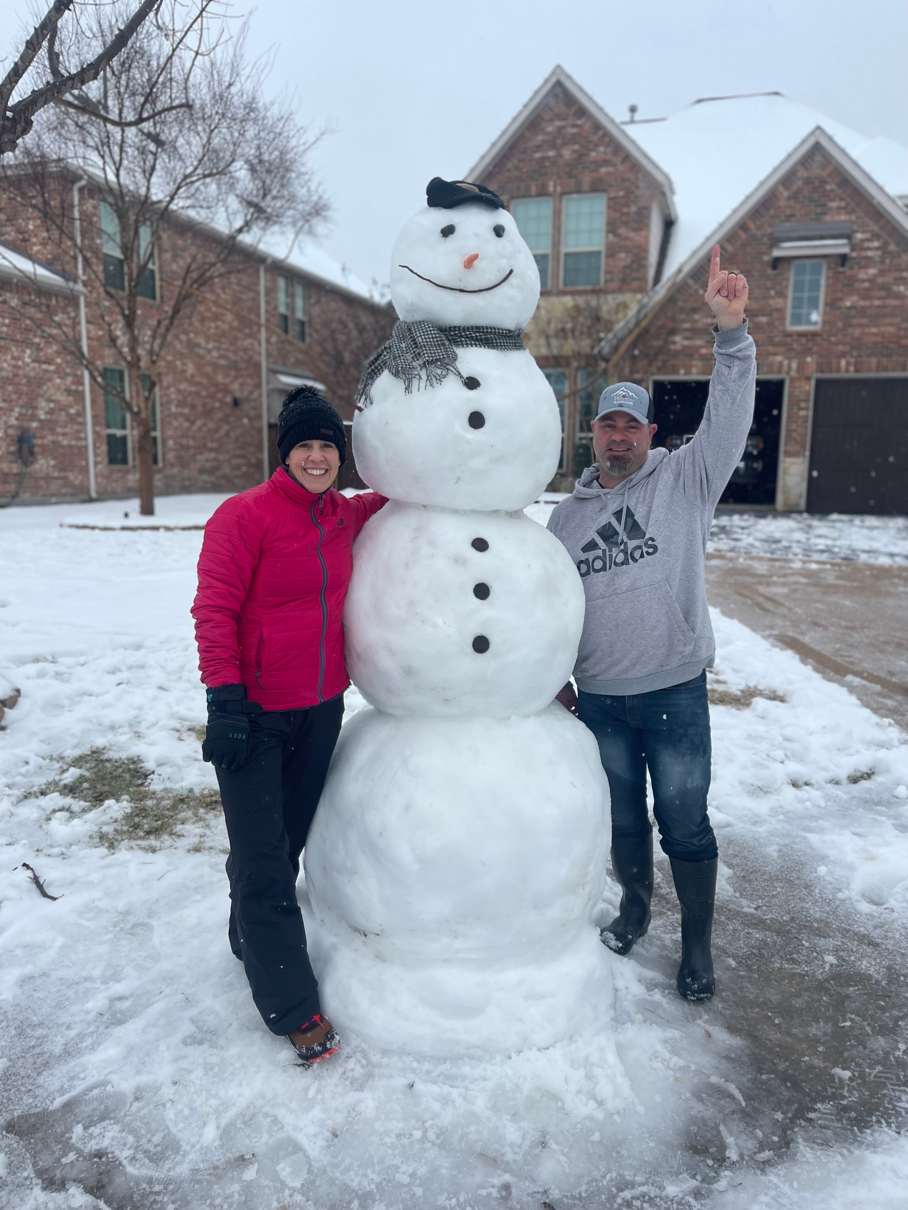 The Most Valuable Snowman! We made this big guy in about an hour. 4 levels tall! Oreos for buttons, carrot nose, stick for arms and rocks for eyes with a scarf and hat ⛄️