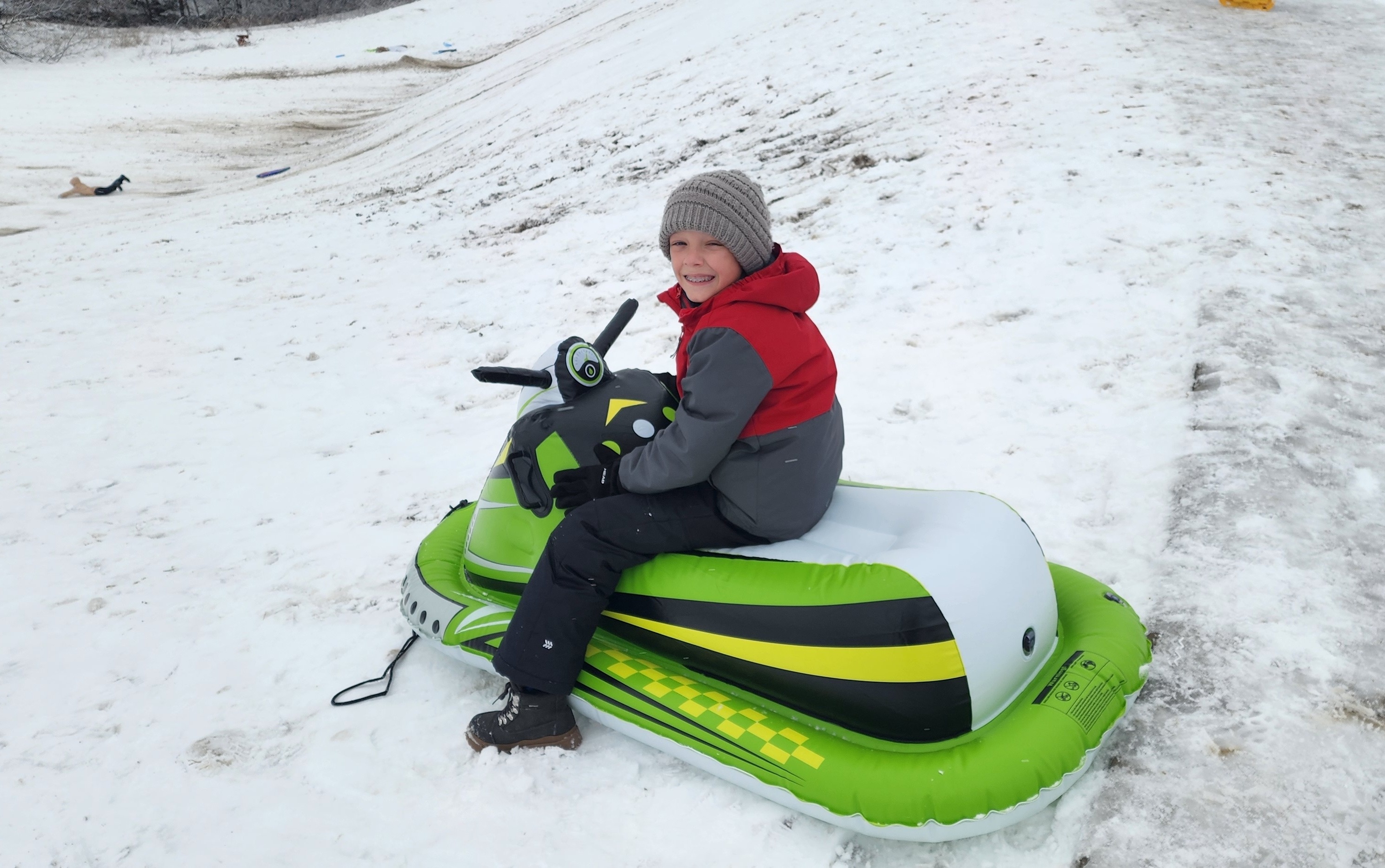 Landon and Mason enjoying rheir snow day on the hills in Adriatica.