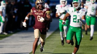 Texas State wide receiver Jaden Williams (0) breaks away from North Texas safety Jayden Hill (21) after catching a pass during the first half of the First Responder Bowl NCAA college football game Friday, Jan. 3, 2025, in Dallas.