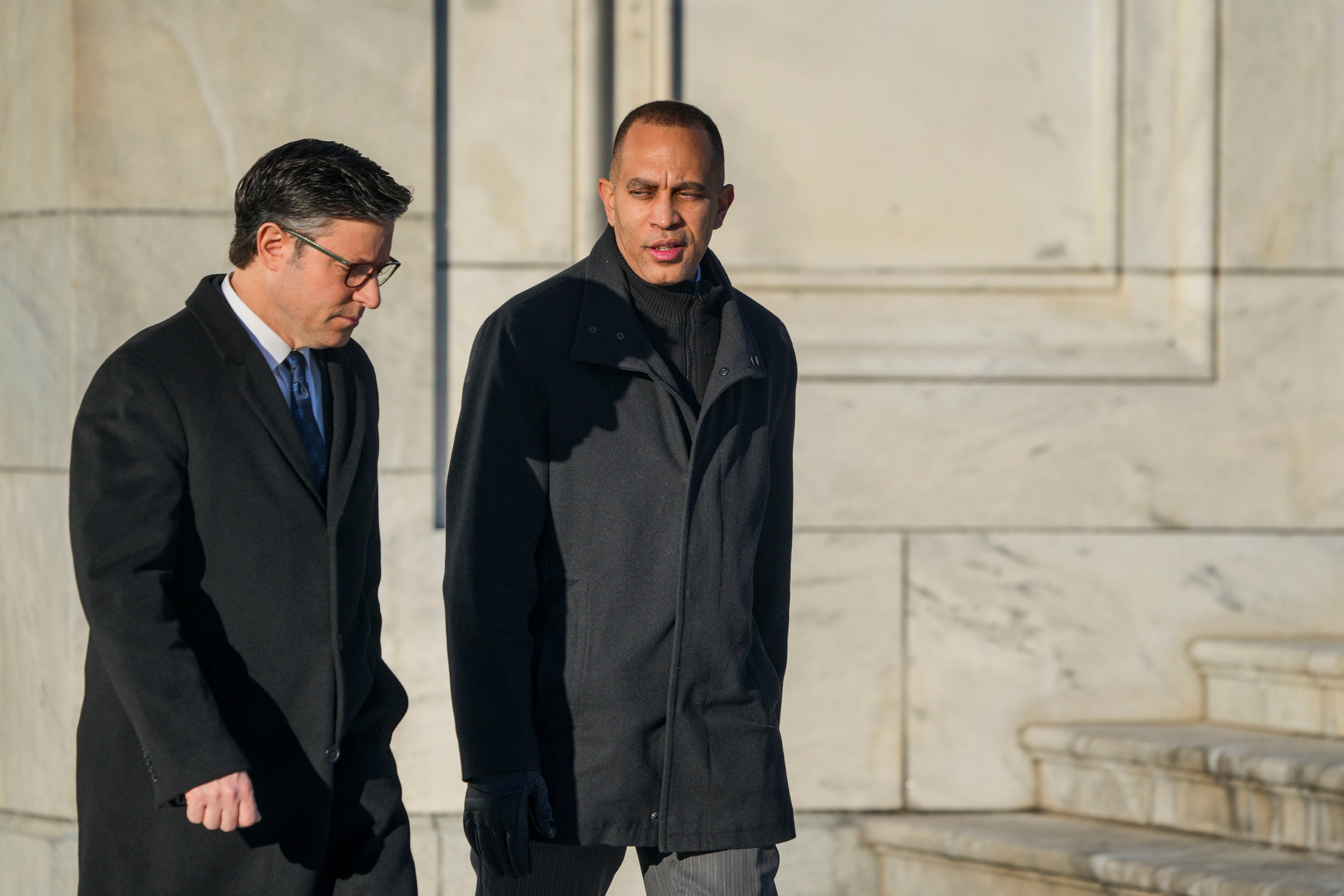 US House Speaker Mike Johnson, a Republican from Louisiana, left, and Representative Hakeem Jeffries, a Democrat from New York, outside the US Capitol in Washington, DC, US, on Thursday, Jan. 9, 2025.