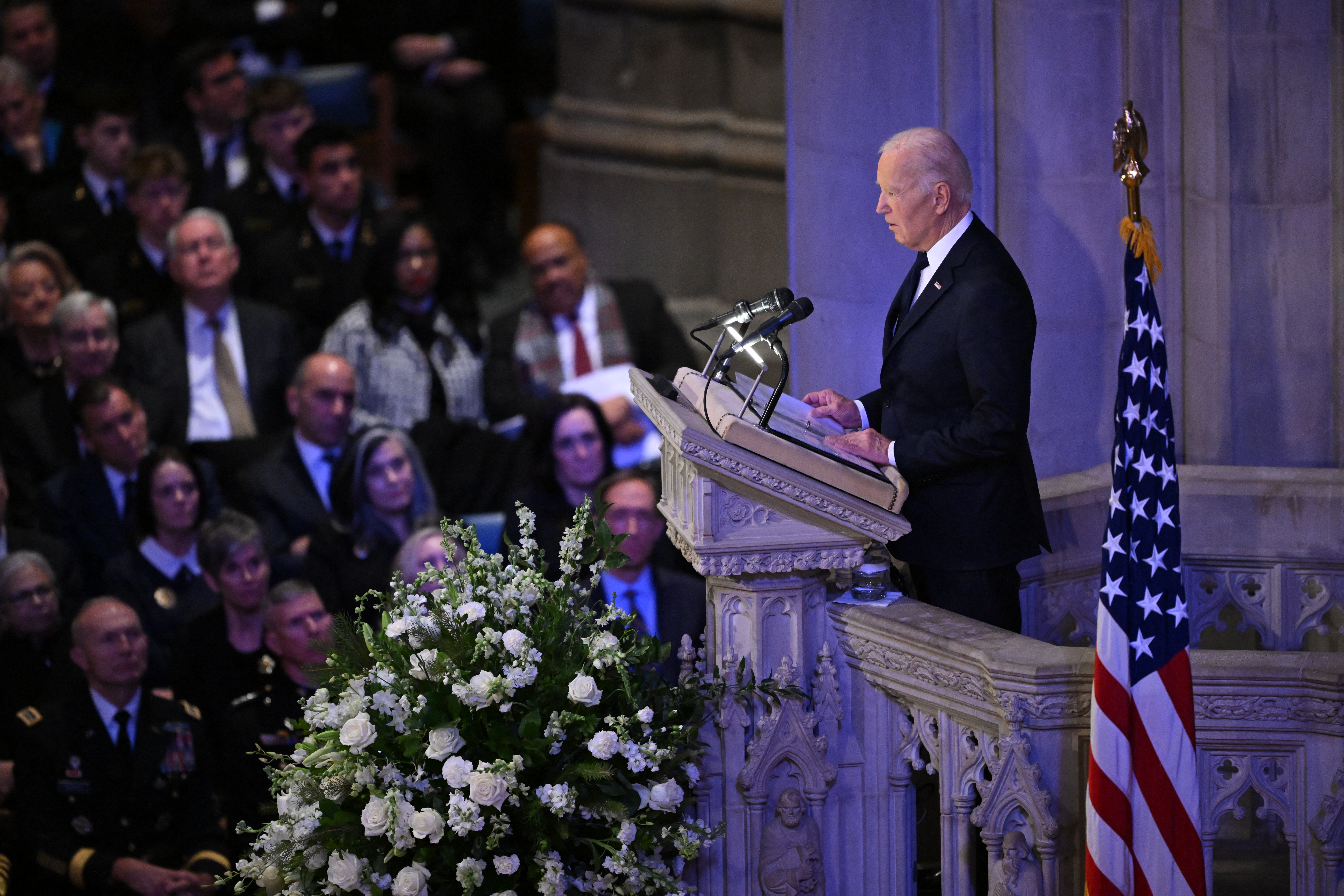 US President Joe Biden delivers the eulogy at the State Funeral Service for former US President Jimmy Carter at the Washington National Cathedral in Washington, DC, on January 9, 2025.