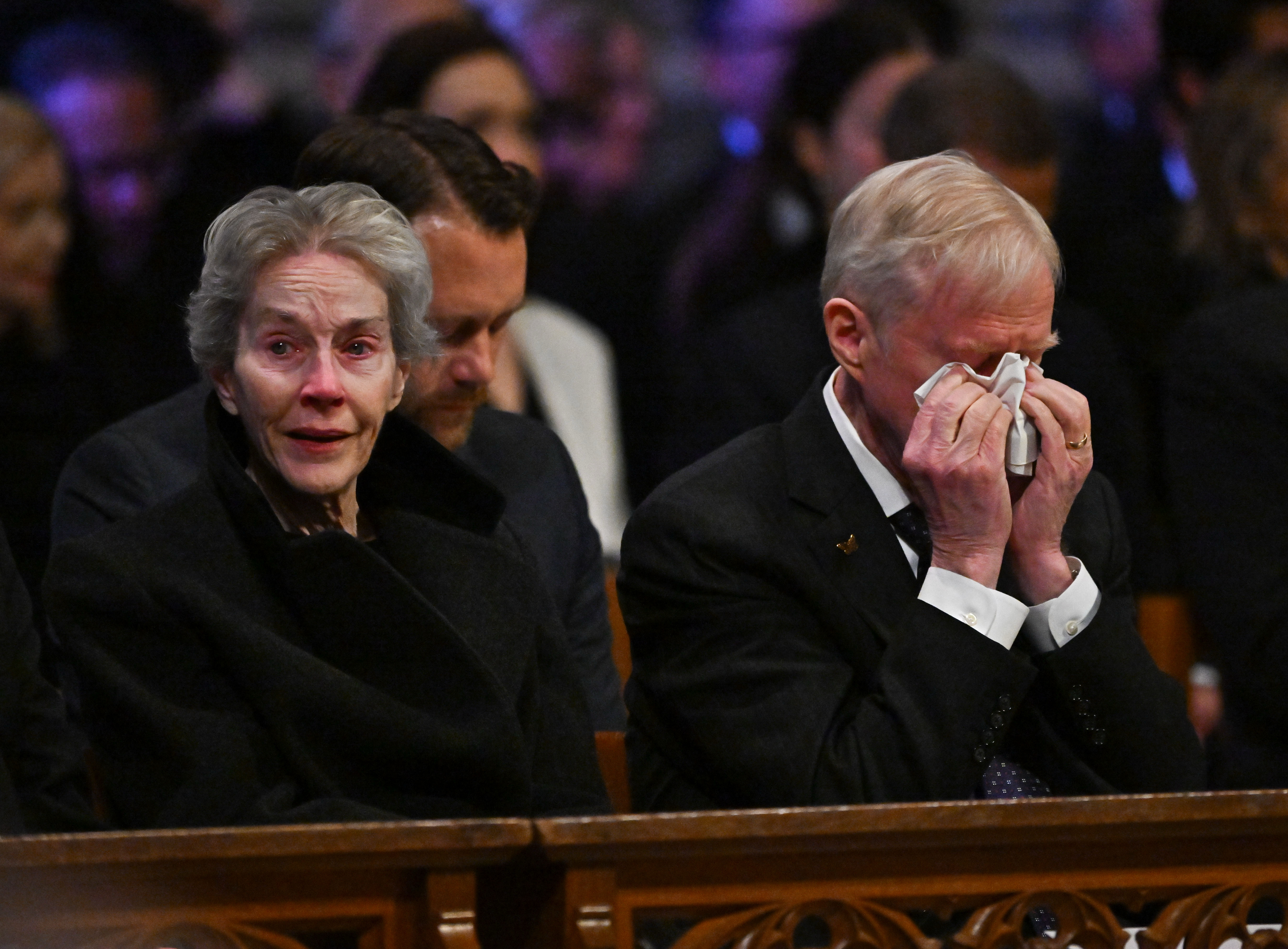 ack Carter and his wife Liz Grandson react at the state funeral services for former President Jimmy Carter at the National Cathedral on January 9, 2025 in Washington, D.C.