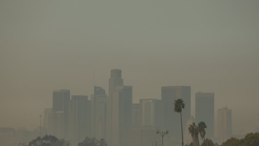 Wildfire smoke from the Palisades and Eaton fires blankets a view of downtown Los Angeles