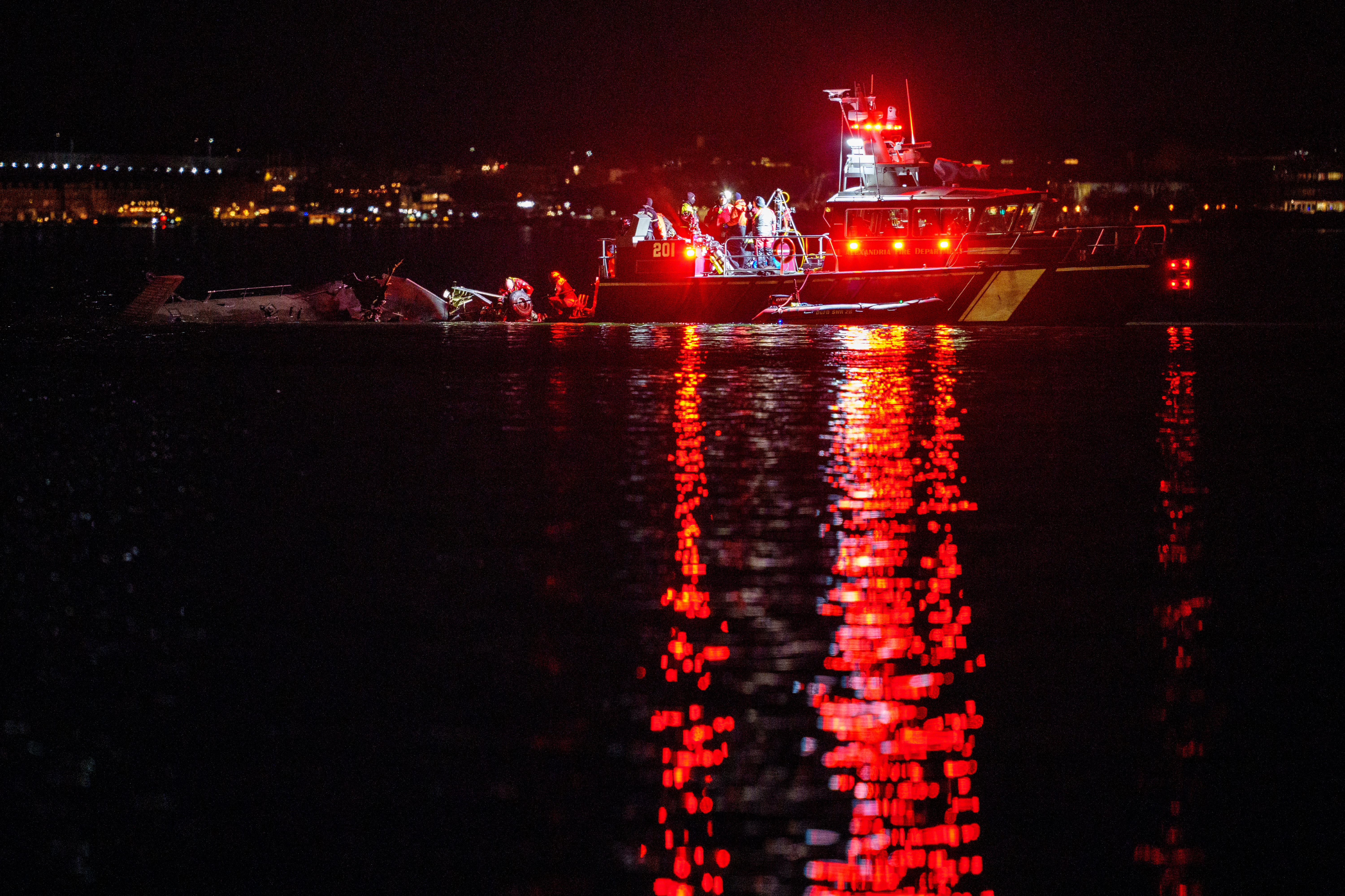 Emergency response teams respond to helicopter wreckage in the Potomac River on Jan. 30, 2025.