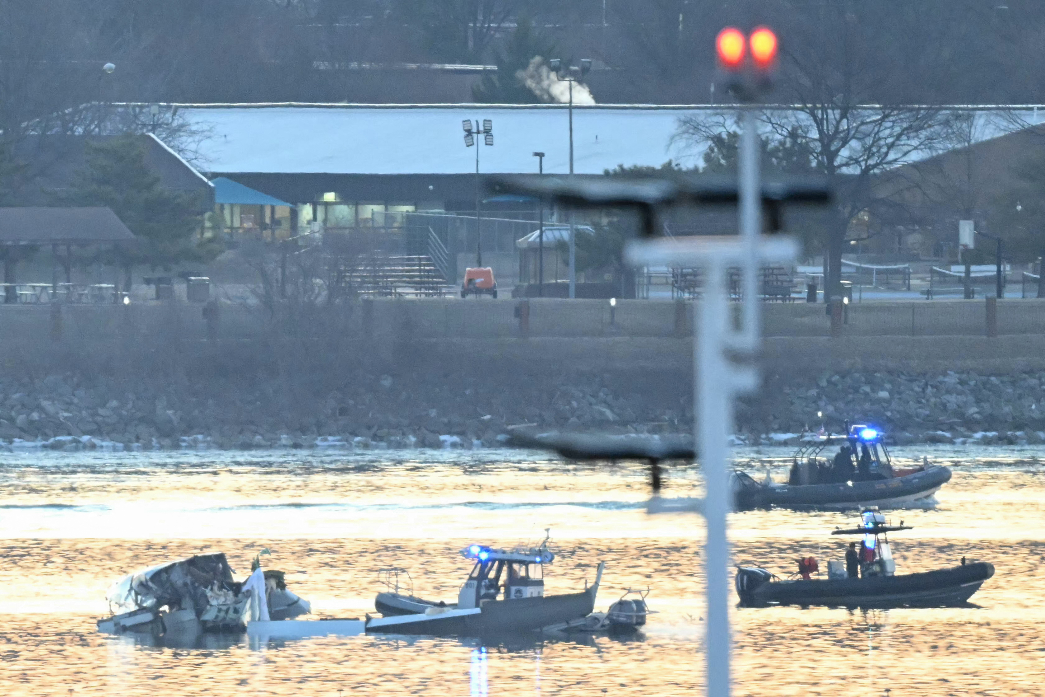 Part of the wreckage is seen as rescue boats search the waters of the Potomac River on Jan. 30, 2025.