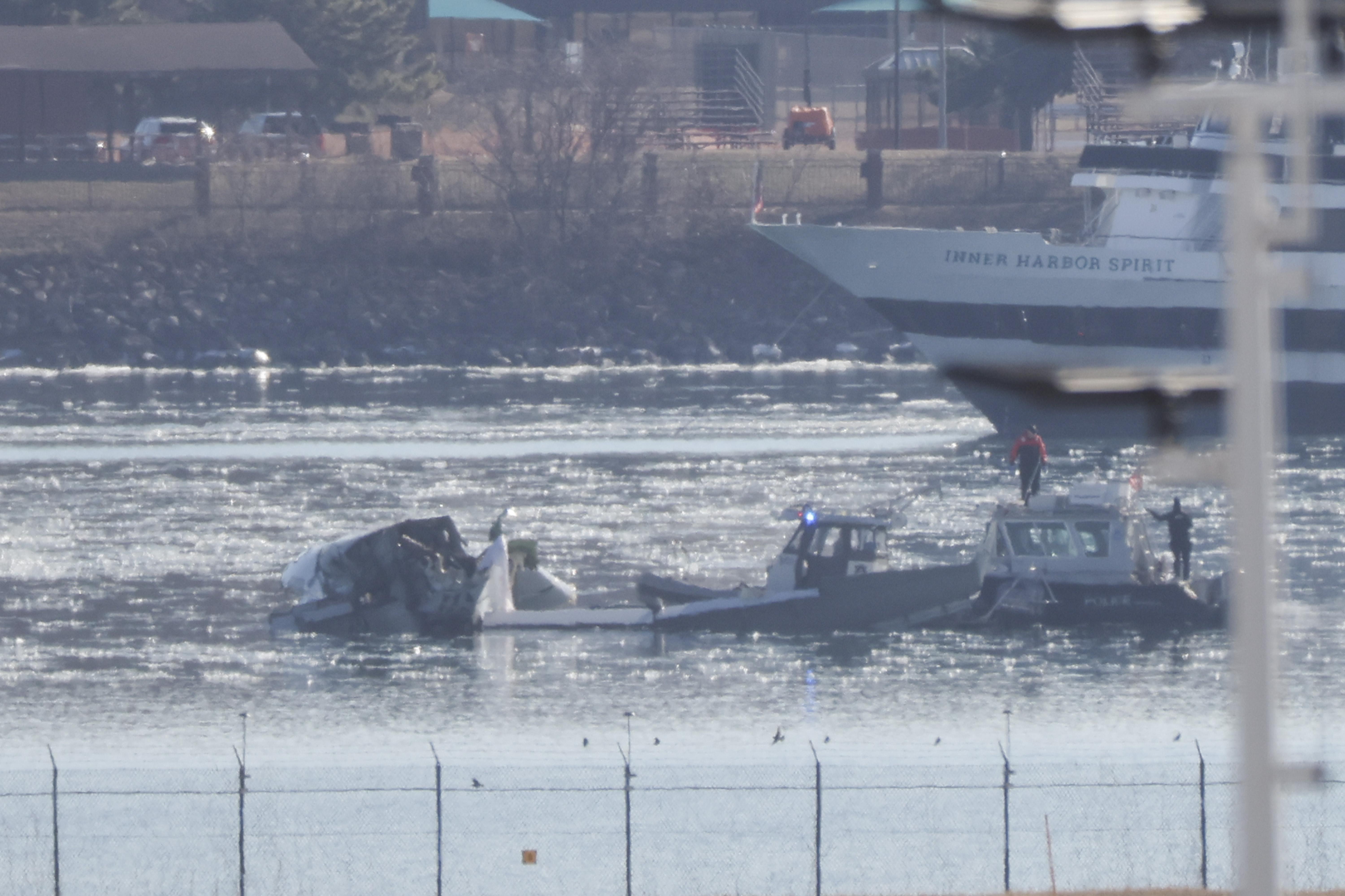 Emergency response units search the crash site of the American Airlines plane on the Potomac River on Jan. 30, 2025.