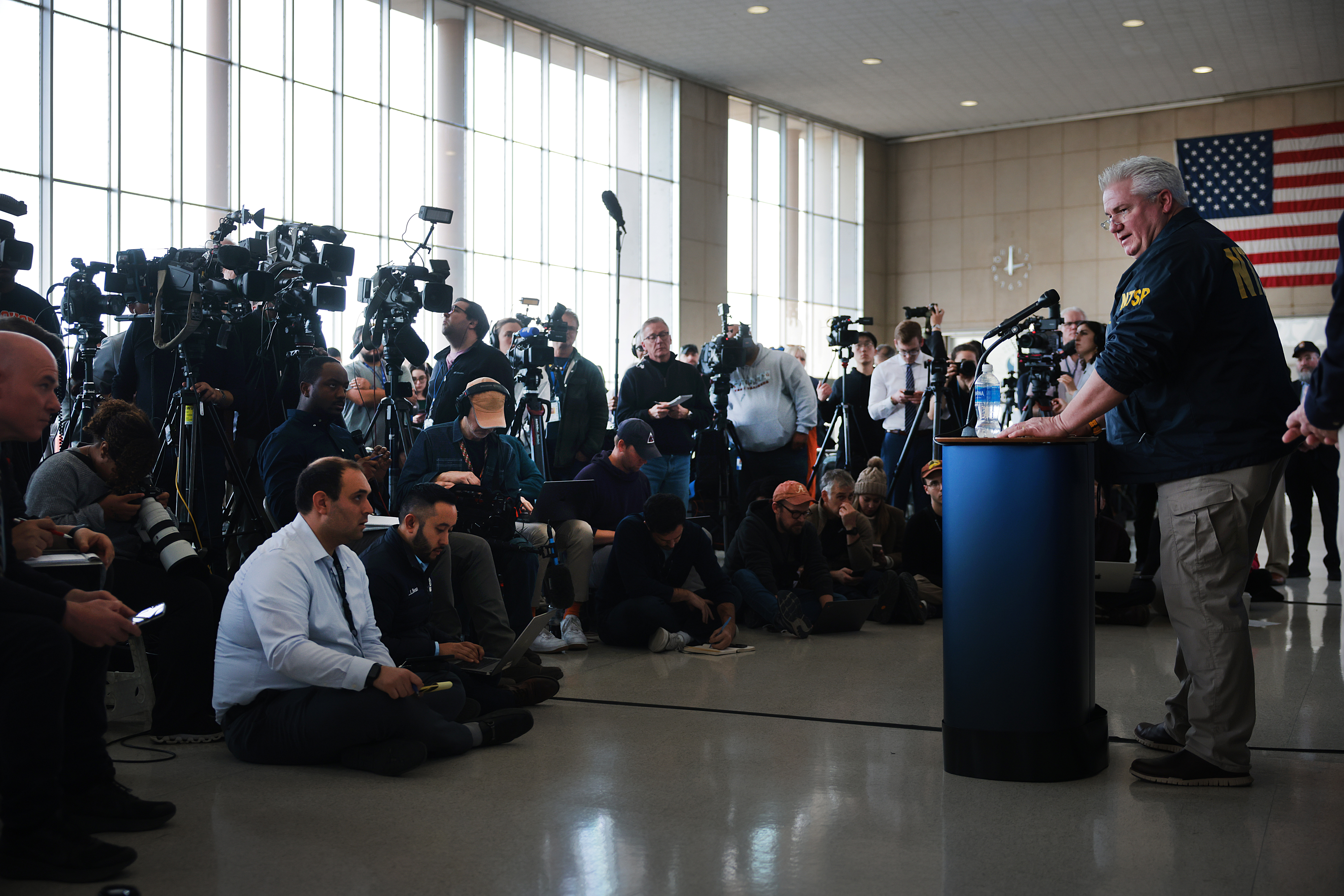 NTSB Member J. Todd Inman speaks during a press conference at Reagan National Airport as the search continues at the crash site, on Jan. 30, 2025.