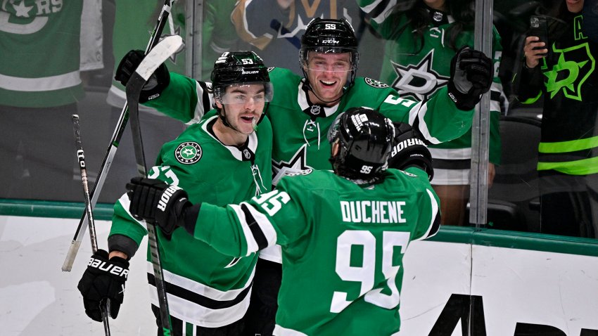 Jan 4, 2025; Dallas, Texas, USA; Dallas Stars center Matt Duchene (95) and center Wyatt Johnston (53) and defenseman Thomas Harley (55) celebrate on the ice after the Stars defeat the Utah Hockey Club in the overtime period at the American Airlines Center. Mandatory Credit: Jerome Miron-Imagn Images