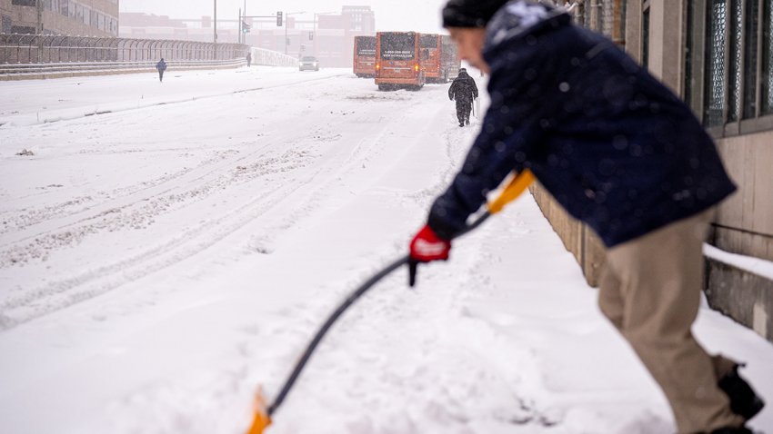 A street is closed after buses become stuck on a hill near Union Station during a winter storm in the nation's capital on Jan. 6, 2025 in Washington, D.C.