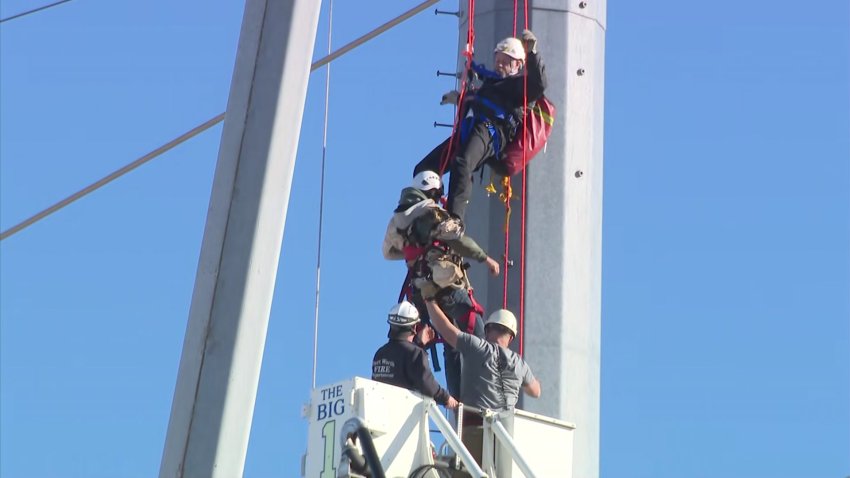 An injured tower worker is rescued in Burleson, Friday, Jan. 24, 2025.