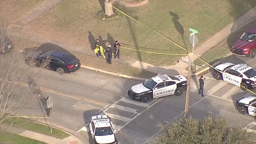 Dallas police investigate a shooting involving an officer on Tuesday, Jan. 7, 2025.