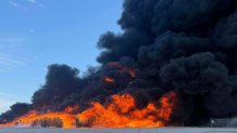 A tractor truck caught fire and spread to stacks of polypropylene pallets at rural repair facility in Wilmer, Texas, on Wednesday, Jan. 8, 2025.