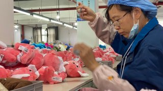 Workers making Care Bears at a factory in Ankang, China.