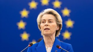 Ursula von der Leyen (CDU, r), President of the European Commission, stands in the plenary chamber of the European Parliament.