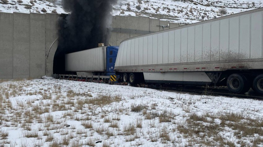 Smoke exits a tunnel