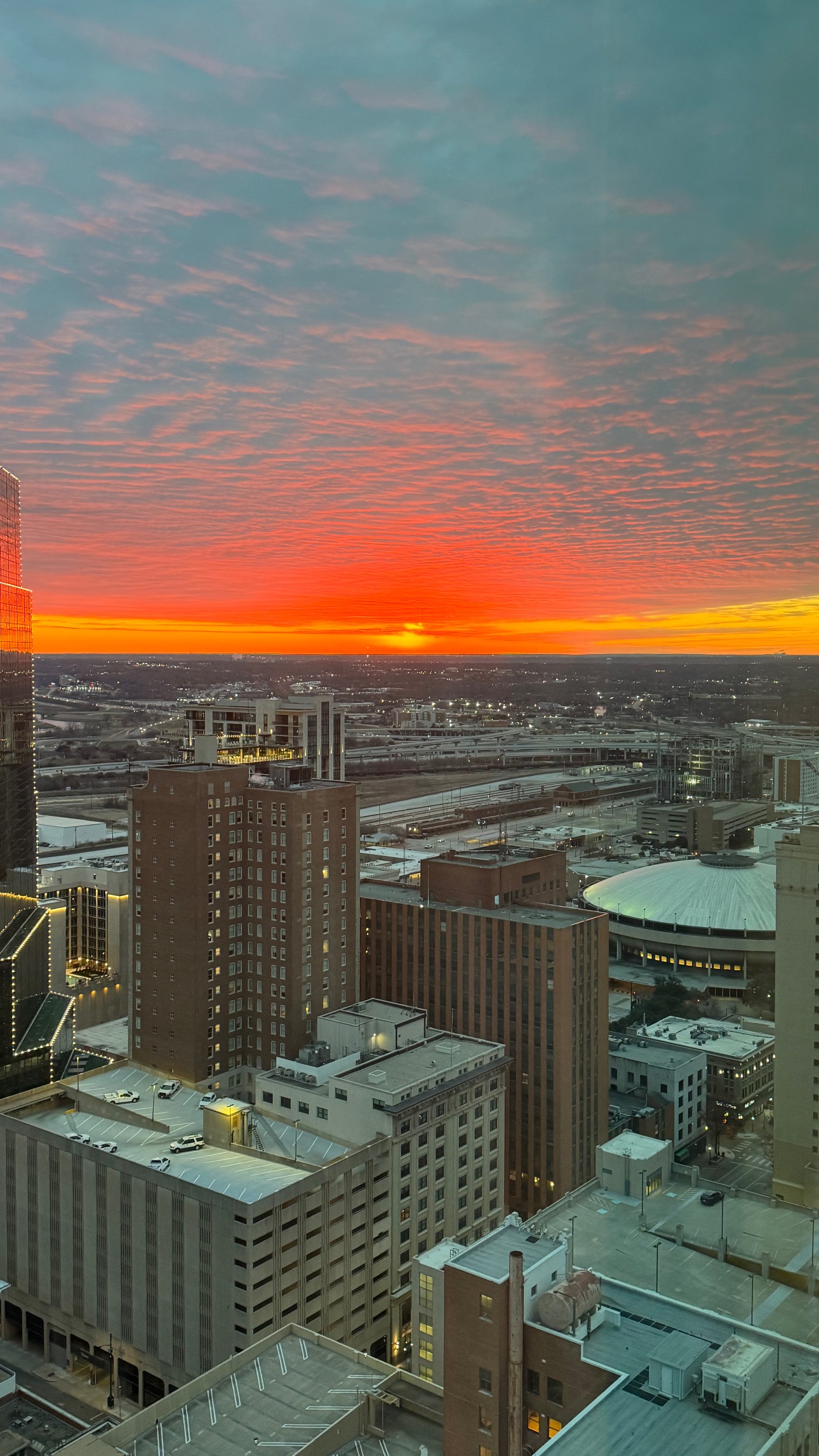 Hello! The sunrises have been spectacular this week. This is one looking from our bedroom window in the tower downtown Fort Worth. Enjoy!