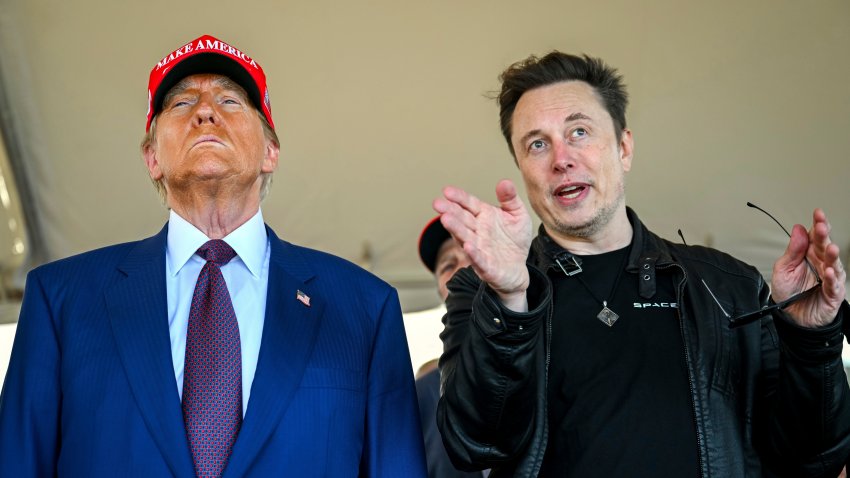 FILE – President-elect Donald Trump listens to Elon Musk as he arrives to watch SpaceX’s mega rocket Starship lift off for a test flight from Starbase in Boca Chica, Texas, Nov. 19, 2024.