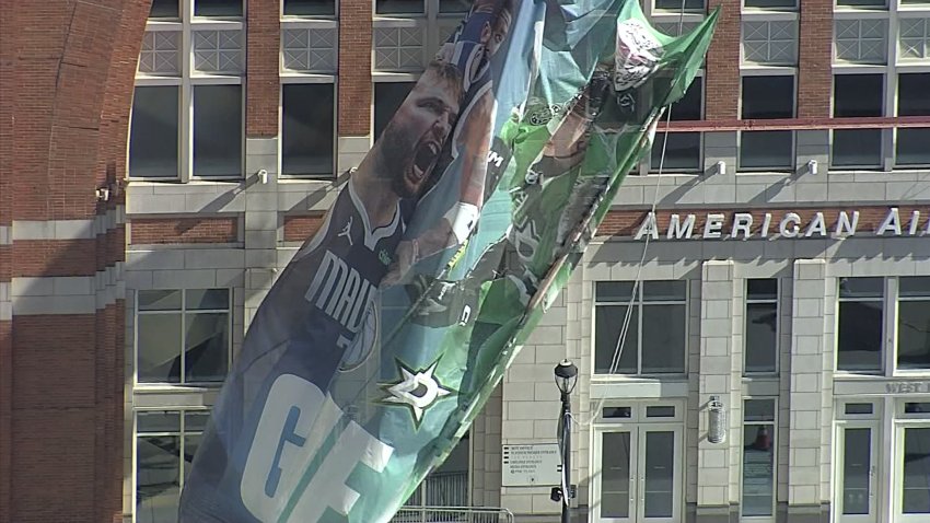 Massive banner featuring NBA superstar Luka Doncic removed in Dallas, Monday, Feb. 3, 2025.