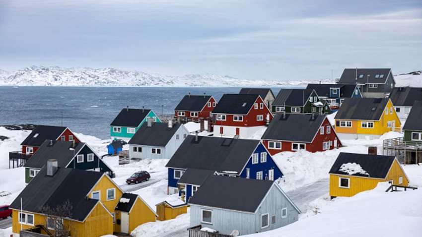 A general view of a residential area of Nuuk, Greenland, on March 10, 2025, on the eve of a parliamentary election  in Greenland, the autonomous Danish territory. Two days of storm and mild weather has ripped political posters of posts and melted snow in Greenland’s capital. 