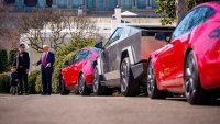 U.S. President Donald Trump, accompanied by White House Senior Advisor, Tesla and SpaceX CEO Elon Musk, and his son X Æ A-Xii, speaks next to a Tesla Model Y, a Cyber Truck, and two Model S vehicles on the South Lawn of the White House on March 11, 2025 in Washington, DC. 