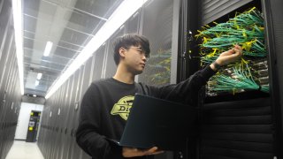 An engineer conducts an inspection in a data center on February 13, 2025  in Urumqi, Xinjiang Uygur Autonomous Region of China. Chinese artificial intelligence firm DeepSeek has launched operations in the city to host computing power infrastructure to support its large language model. (Photo by VCG/VCG via Getty Images)