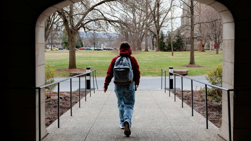 A person walks on campus at Muhlenberg College in Allentown, Pennsylvania, U.S. March 26, 2025. 