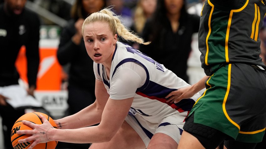 TCU guard Hailey Van Lith looks to pass around Baylor guard Jada Walker (11) during the second half of an NCAA college basketball game for the Big 12 women’s tournament championship Sunday, March 9, 2025, in Kansas City, Mo. (AP Photo/Charlie Riedel)