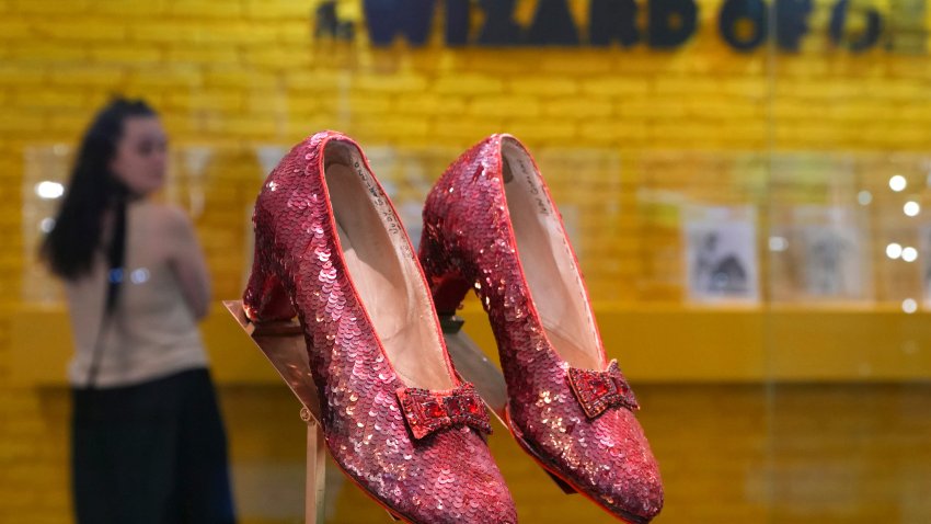 FILE – The original ruby slippers worn by Judy Garland in the classic 1939 film The Wizard of Oz are displayed in London ahead of being offered for auction on Dec. 7, at Heritage Auctions in the US, Wednesday, Nov. 27, 2024.