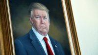 President Donald Trump's portrait hangs in the Colorado Capitol after an unveiling ceremony, Aug. 1, 2019, in Denver.