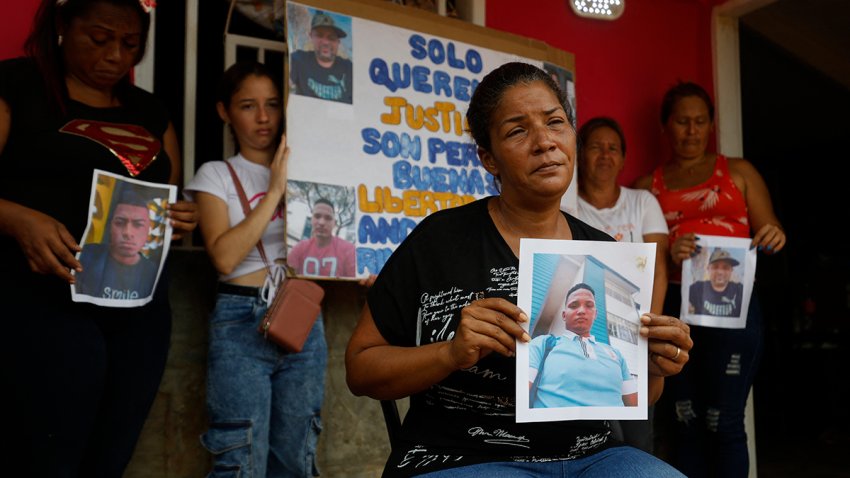 Mercedes Yamarte holds a picture of her son Melvin Yamarte, who was deported from US to a Salvadorean jail, in Maracaibo, Venezuela on March 18, 2025.