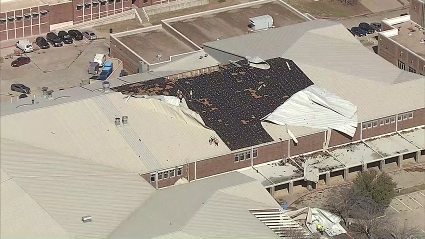 Roof damage at Plano West Senior High School in Plano, Texas, Tuesday, March 4, 2025.