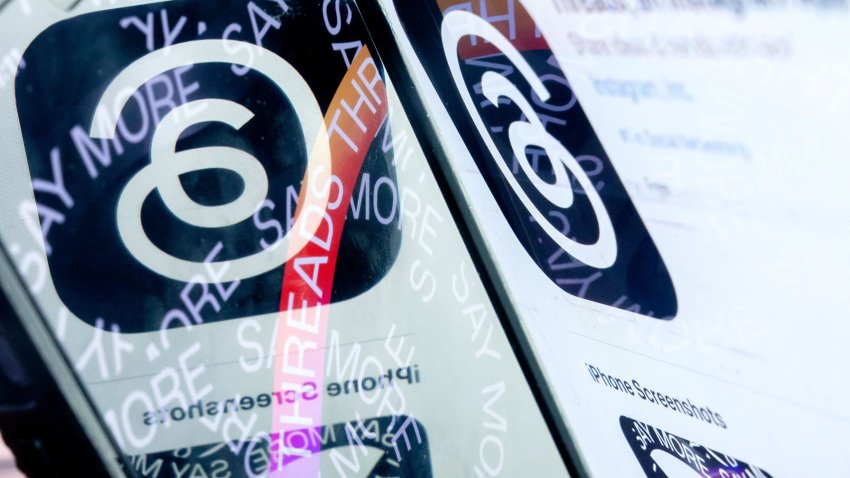 This photo illustration created  in Washington, DC, on July 6, 2023, shows the logo for Threads, an Instagram app, reflected in its opening page. 
