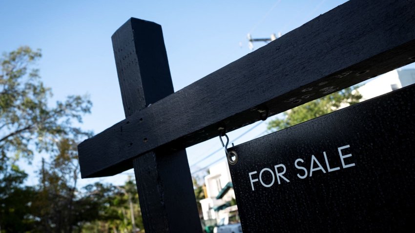 A “For Sale” sign stands at a house in Miami, Florida, U.S. April 16, 2025.