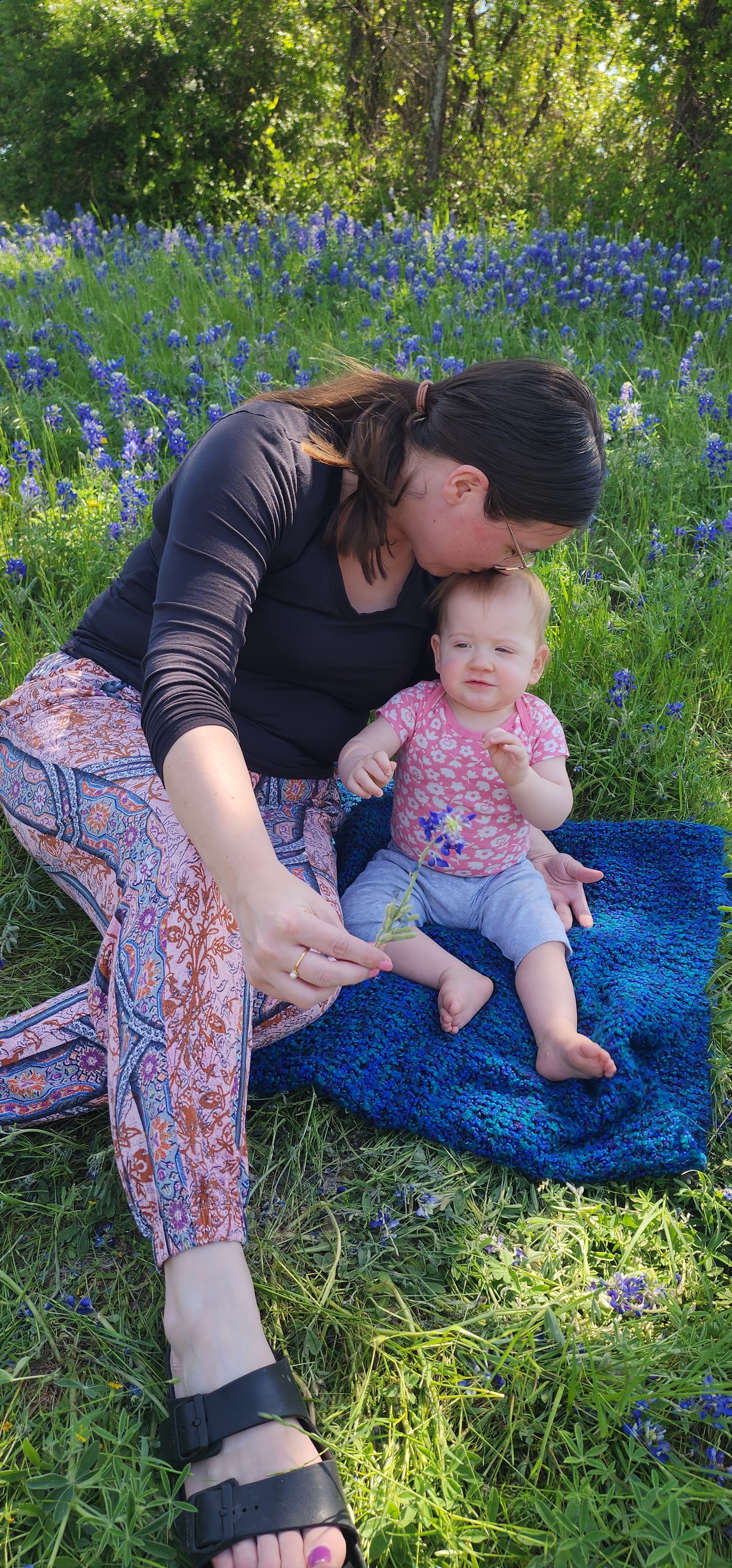 Taken Sunday 414 in Fort Worth.<br />
This is Summer Ann and this is her first bluebonnet season. She is 11<br />
months old.<br />
Mom and Nana were her.