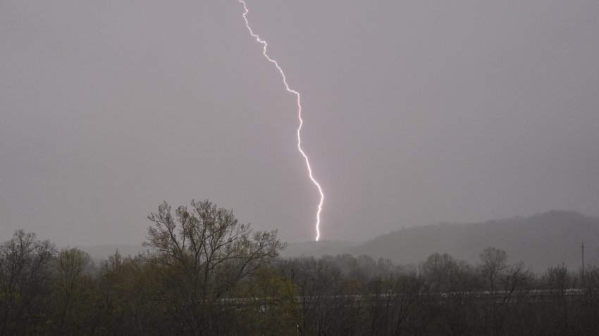 Lightning strikes as storms move through the area Wednesday, April 2, 2025, in Ashland City, Tenn. (AP Photo/George Walker IV)