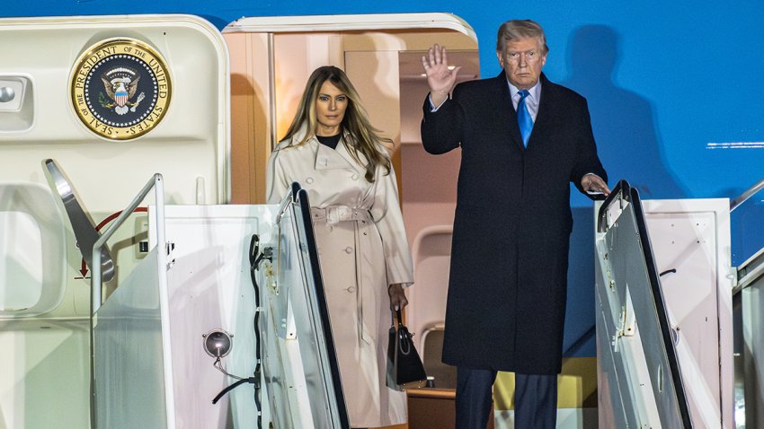 President Donald Trump and first lady Melania Trump step off Air Force One upon arrival at the Fiumicino Airport on April 25, 2025 in Rome.